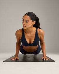 SoftMotion™ Scoop Back Bralette with Grey Logo | True Blue