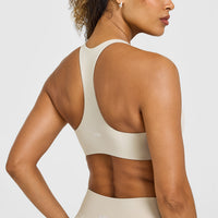 SoftMotion™ Bralette with White Logo | Sand