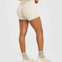 SoftMotion™ High Waisted Shorts 6" with White Logo | Sand