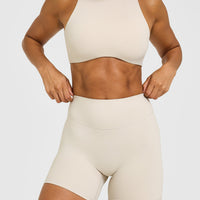 SoftMotion™ High Waisted Shorts 6" with White Logo | Sand