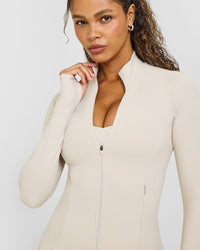 SoftMotion™ Jacket with White Logo | Sand