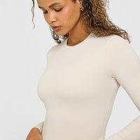 SoftMotion™ Long Sleeve Mid Top with White Logo | Sand