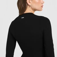 SoftMotion™ Long Sleeve Top with White Logo | Black