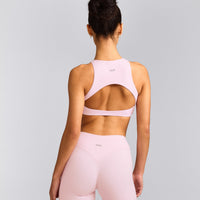 SoftMotion™ High Neck Sports Bra with Grey Logo | Soft Girl Pink