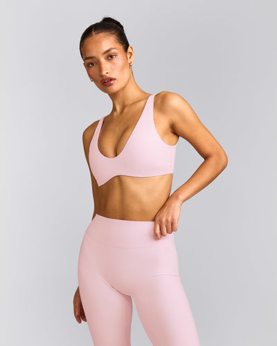 SoftMotion™ Scoop Back Bralette with Grey Logo | Soft Girl Pink
