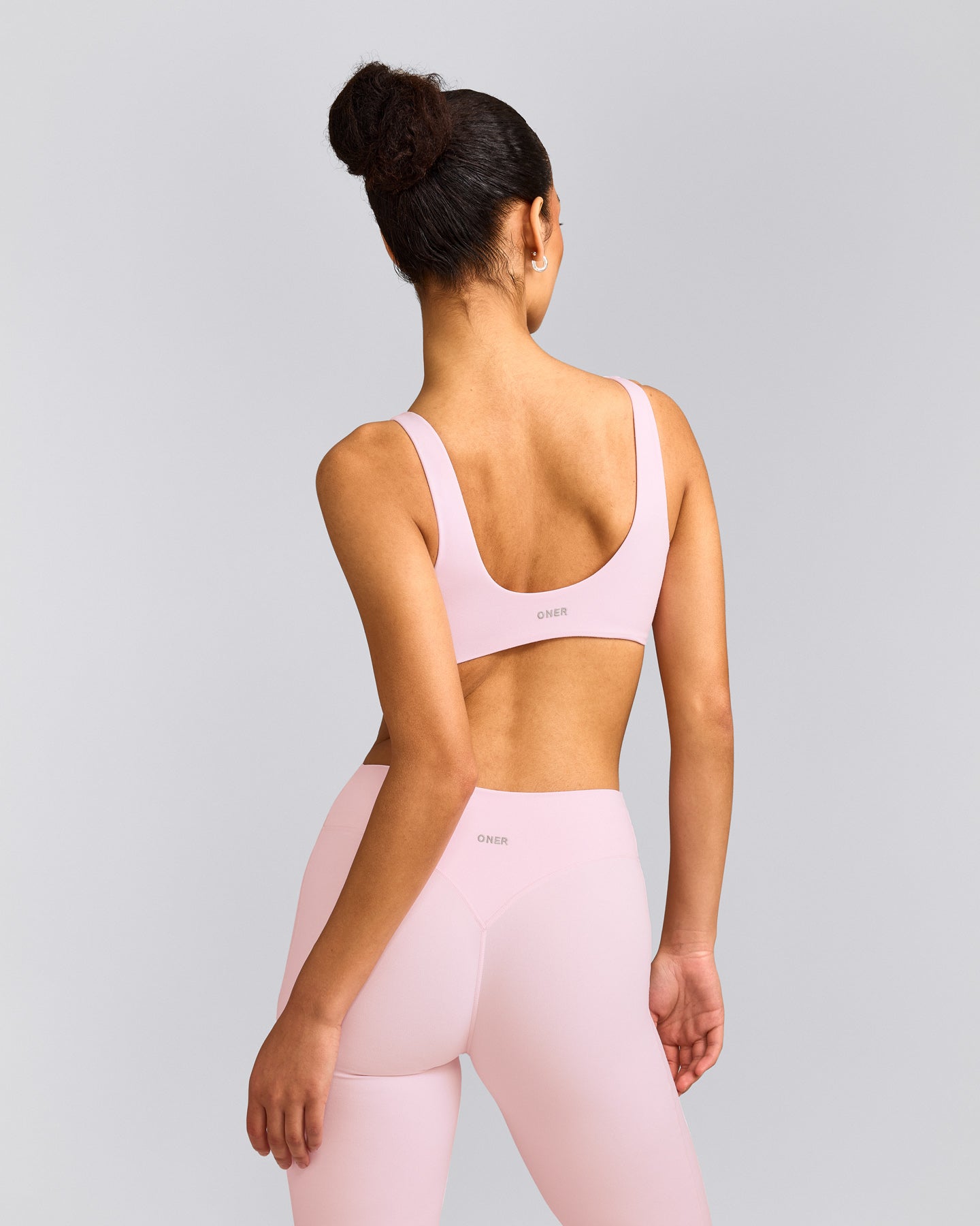 SoftMotion™ Scoop Back Bralette with Grey Logo | Soft Girl Pink