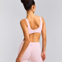 SoftMotion™ Scoop Back Bralette with Grey Logo | Soft Girl Pink