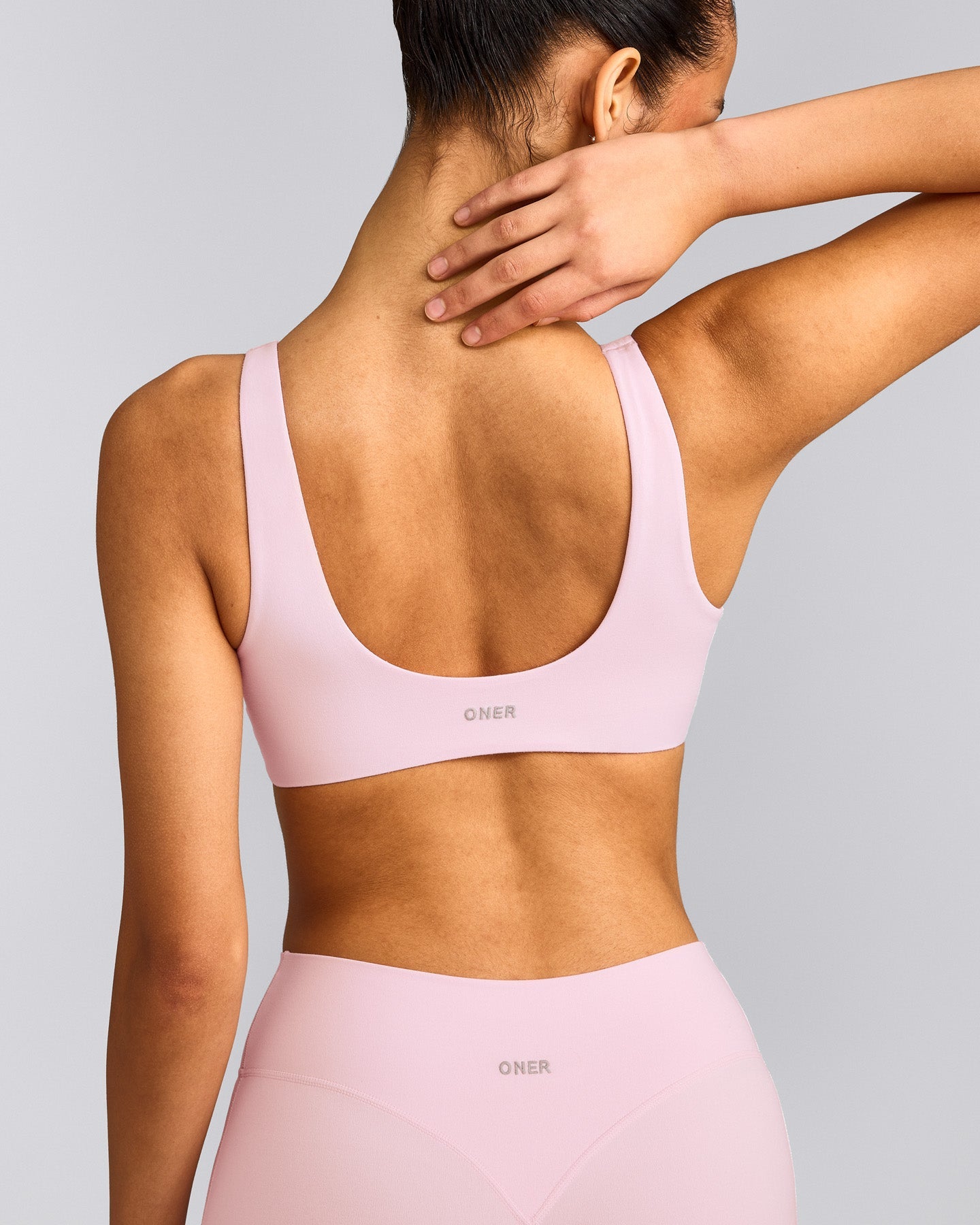 SoftMotion™ Scoop Back Bralette with Grey Logo | Soft Girl Pink