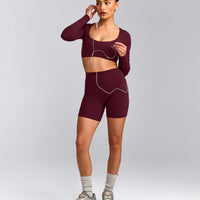 SoftMotion™ Scoop Neck Long Sleeve Crop Top with Built in Bra Shelf with Grey Logo | Cherry Lacquer Purple