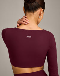 SoftMotion™ Scoop Neck Long Sleeve Crop Top with Built in Bra Shelf with Grey Logo | Cherry Lacquer Purple