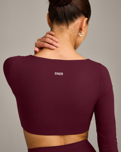 SoftMotion™ Scoop Neck Long Sleeve Crop Top with Built in Bra Shelf with Grey Logo | Cherry Lacquer Purple