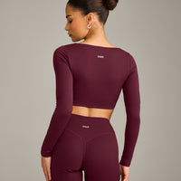 SoftMotion™ Scoop Neck Long Sleeve Crop Top with Built in Bra Shelf with Grey Logo | Cherry Lacquer Purple