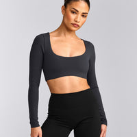 SoftMotion™ Scoop Neck Long Sleeve Crop Top with Built in Bra Shelf with Grey Logo | Coal