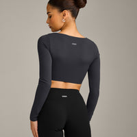 SoftMotion™ Scoop Neck Long Sleeve Crop Top with Built in Bra Shelf with Grey Logo | Coal