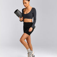 SoftMotion™ Scoop Neck Long Sleeve Crop Top with Built in Bra Shelf with Grey Logo | Coal