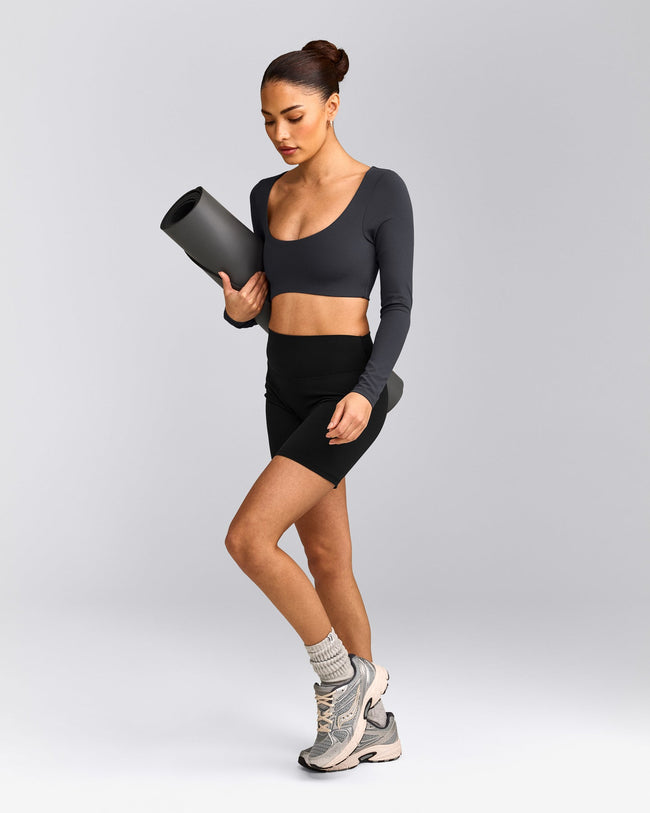 SoftMotion™ Scoop Neck Long Sleeve Crop Top with Built in Bra Shelf with Grey Logo | Coal