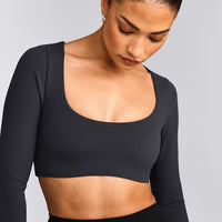 SoftMotion™ Scoop Neck Long Sleeve Crop Top with Built in Bra Shelf with Grey Logo | Coal