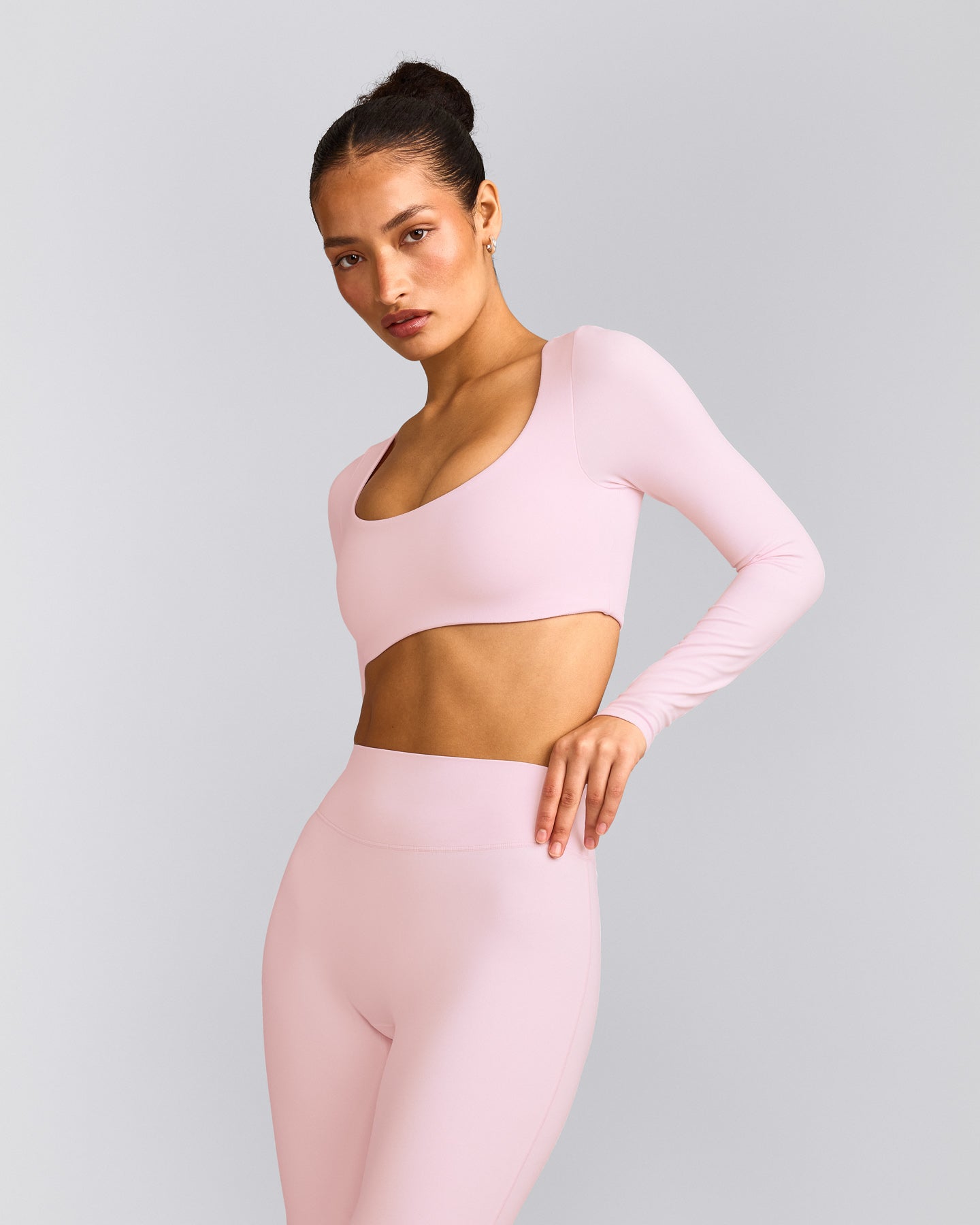 SoftMotion™ Scoop Neck Long Sleeve Crop Top with Built in Bra Shelf with Grey Logo | Soft Girl Pink