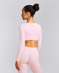SoftMotion™ Scoop Neck Long Sleeve Crop Top with Built in Bra Shelf with Grey Logo | Soft Girl Pink