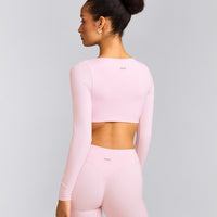 SoftMotion™ Scoop Neck Long Sleeve Crop Top with Built in Bra Shelf with Grey Logo | Soft Girl Pink