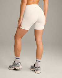 UnifiedMove™ High Waisted Shorts 6" with Reflective Logo | Marshmallow White