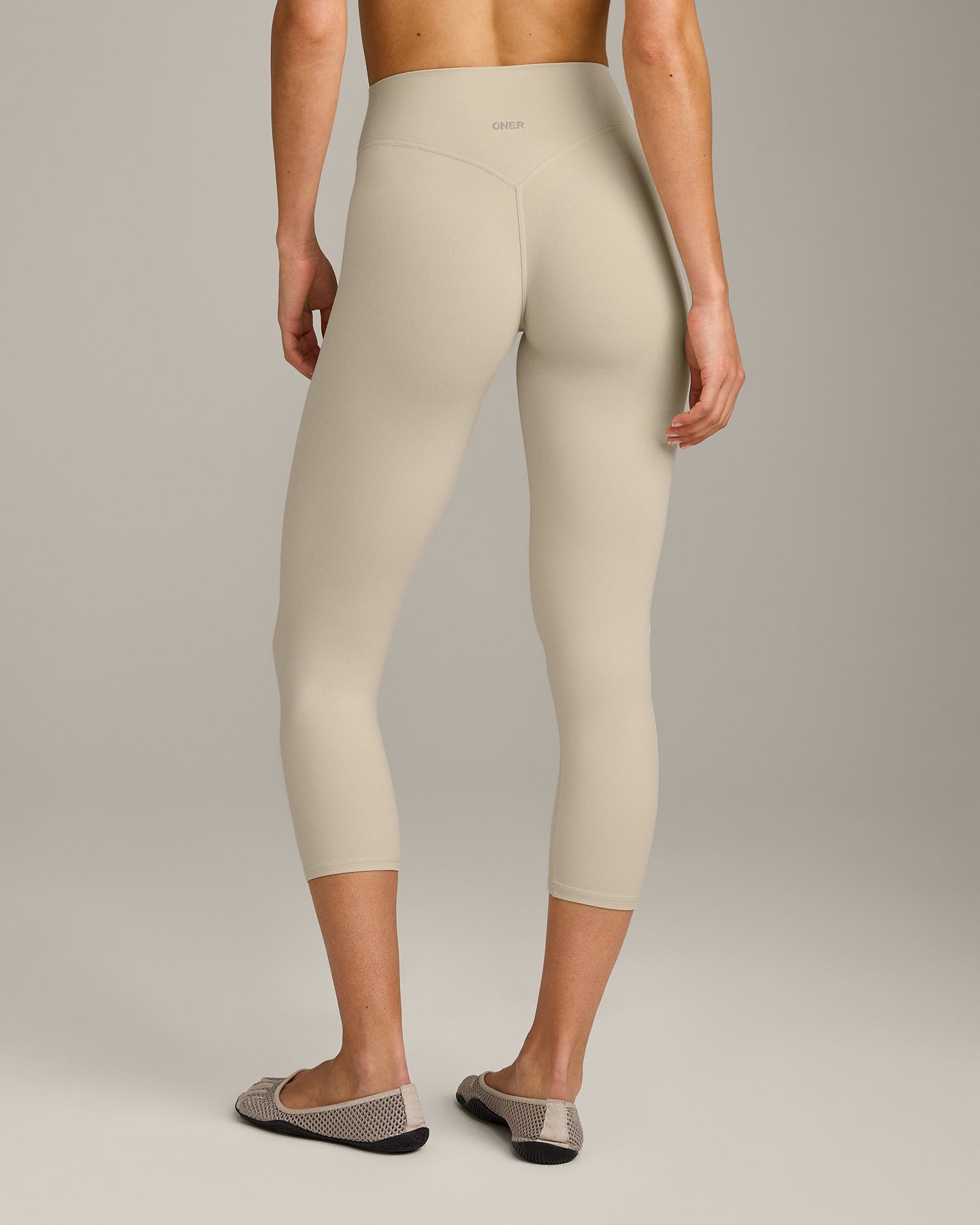 SoftMotion™ 3/4 Length Leggings with Grey Logo | Oatmeal