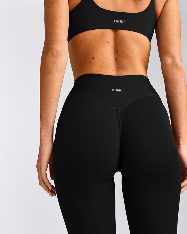 SoftMotion™ 3/4 Length Leggings with Grey Logo | Black