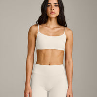 SoftMotion™ Strappy Sports Bra with Grey Logo | Marshmallow White