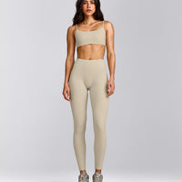 SoftMotion™ Strappy Sports Bra with Grey Logo | Oatmeal