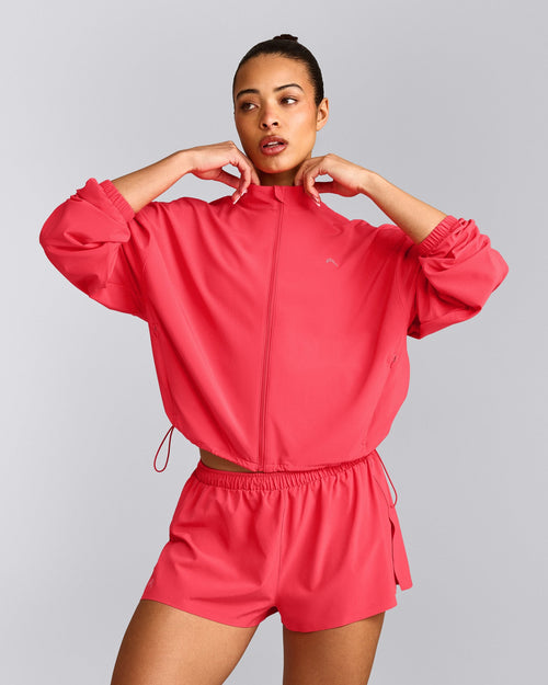 AirMove™ Jacket with Bonding with Reflective Logo | Charged Pink
