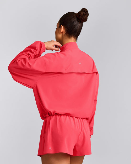 AirMove™ Jacket with Bonding with Reflective Logo | Charged Pink