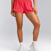 AirMove™ Lined Shorts 2" with Pocket and Reflective Logo | Charged Pink