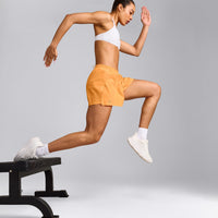 AirMove™ Lined Shorts 4" with Pocket and Reflective Logo | Powdered Orange