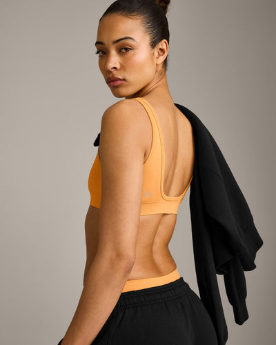 EffortlessLift™ Square Neck Sports Bra with Grey Logo | Powdered Orange