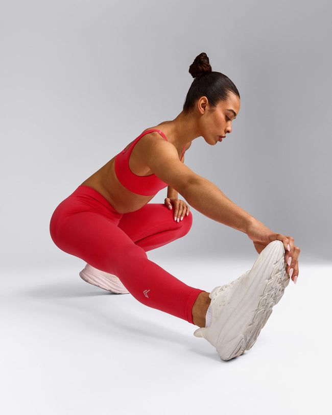 EffortlessLift™ Seamless Mid Rise Leggings with Grey Logo | Charged Pink