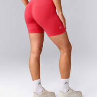 EffortlessLift™ Seamless Mid Rise Shorts with Grey Logo | Charged Pink