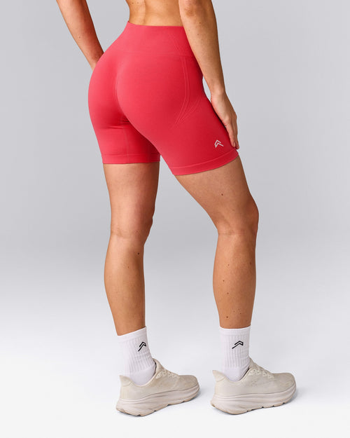 EffortlessLift™ Seamless Mid Rise Shorts with Grey Logo | Charged Pink