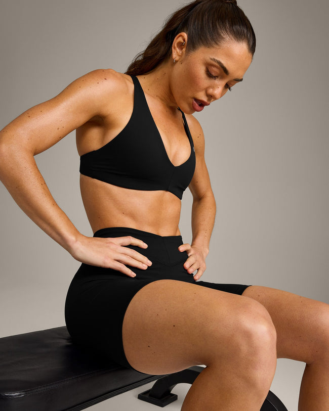 UnifiedMove™ Cross Back Sports Bra with Reflective Logo | Black