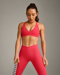 UnifiedMove™ Cross Back Sports Bra with Reflective Logo | Charged Pink