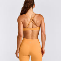 UnifiedMove™ Cross Back Sports Bra with Reflective Logo | Powdered Orange