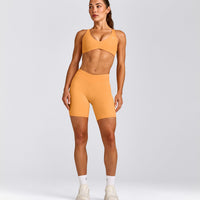 UnifiedMove™ Cross Back Sports Bra with Reflective Logo | Powdered Orange
