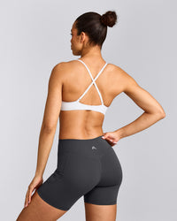 UnifiedMove™ Cross Back Sports Bra with Reflective Logo | White