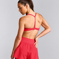 UnifiedMove™ T Back Minimal Bralette with Reflective Logo | Charged Pink