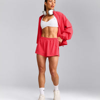 UnifiedMove™ T Back Minimal Bralette with Reflective Logo | White