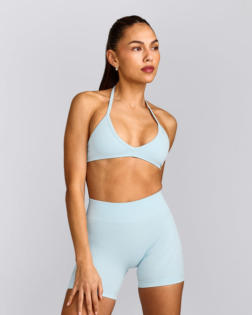 EnhanceLift™ Seamless Minimal Halter Neck Bralette with Grey Logo | Cloud Blue