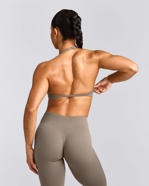 EnhanceLift™ Seamless Minimal Halter Neck Bralette with Grey Logo | Warm Minky