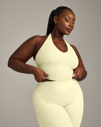 SoftMotion™ Halter Neck Mid Vest with Built in Bra Shelf with Grey Logo | Pastel Yellow