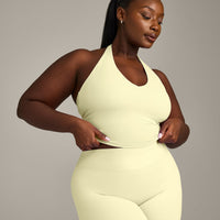 SoftMotion™ Halter Neck Mid Vest with Built in Bra Shelf with Grey Logo | Pastel Yellow