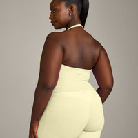 SoftMotion™ Halter Neck Mid Vest with Built in Bra Shelf with Grey Logo | Pastel Yellow