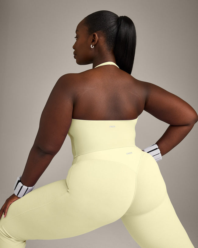 SoftMotion™ Halter Neck Mid Vest with Built in Bra Shelf with Grey Logo | Pastel Yellow